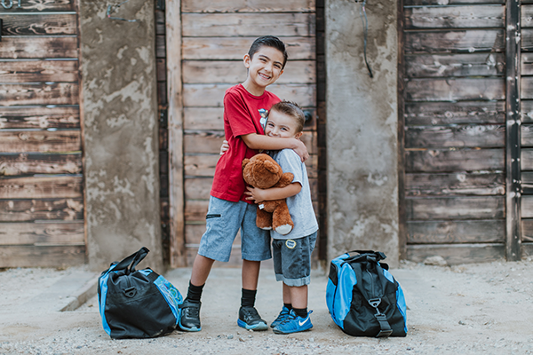 Kids with gifts and Christmas Tree